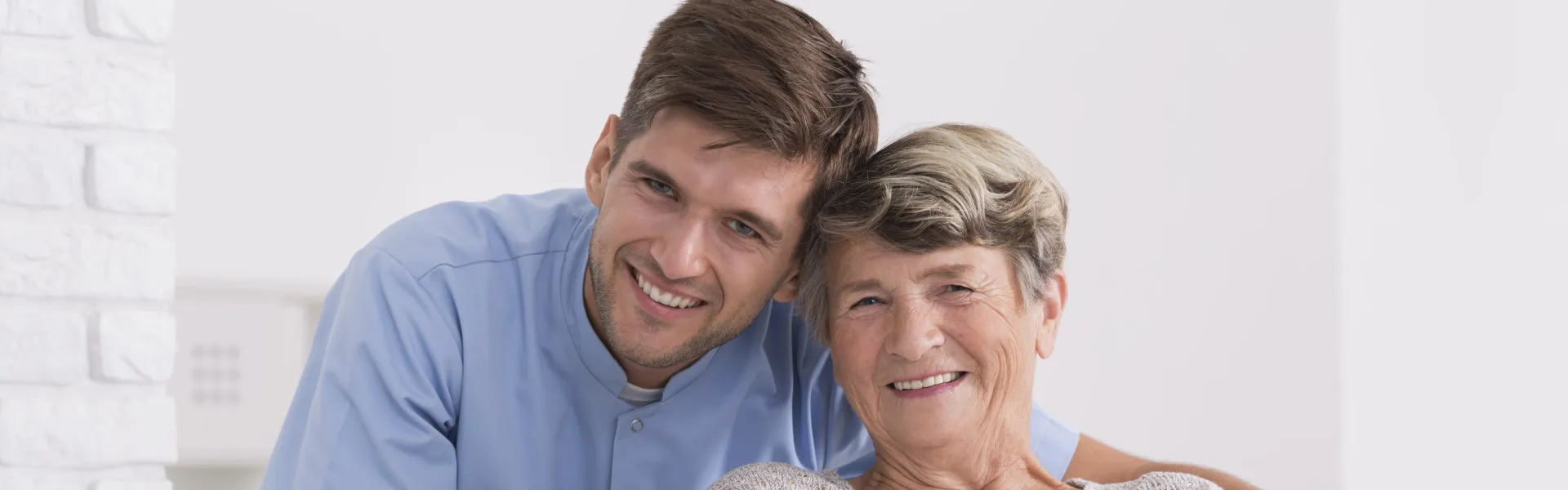 Family caregiver passing duties smoothly to a professional respite provider - Hero Slide 1